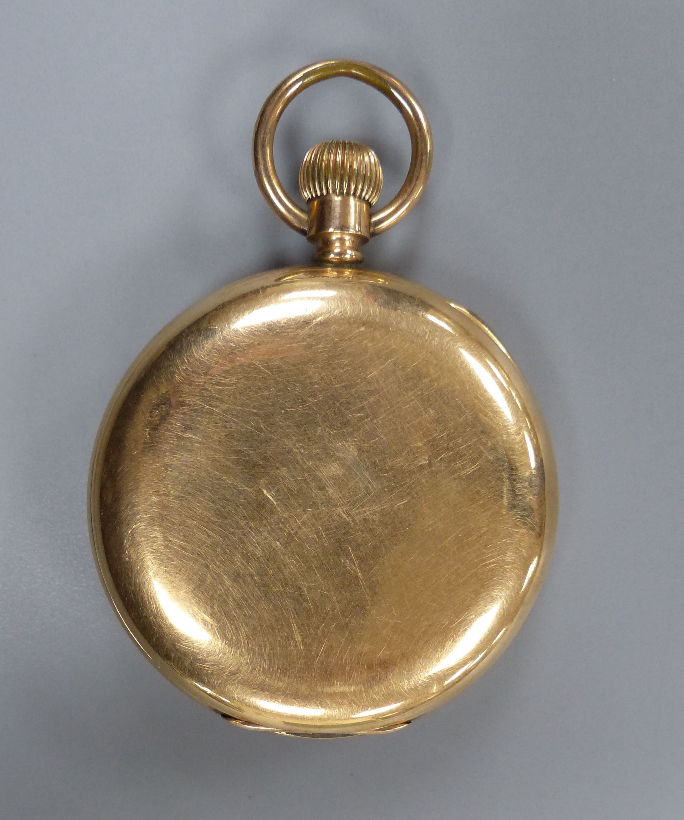 A gold plated half hunter pocket watch and a 375 and cultured pearl set tie pin, 55mm.
